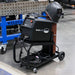 Eastwood low profile welding cart supporting a welder inside a fabrication workshop.