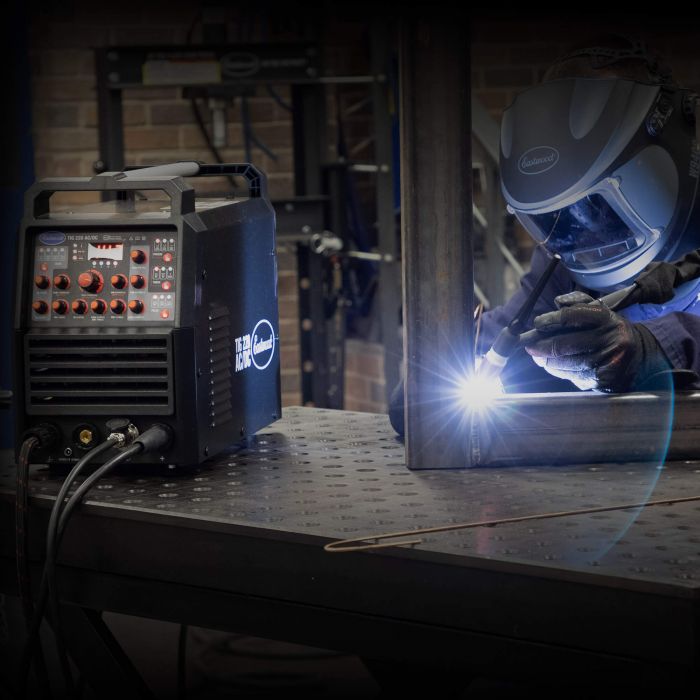 Eastwood TIG 220 AC/DC welder performing TIG welding during a fabrication project
