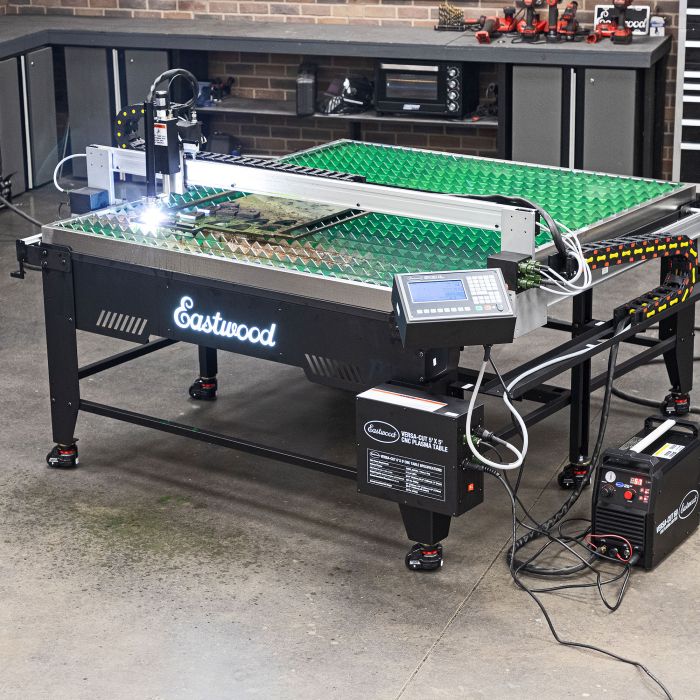 Eastwood Versa-Cut 5x5 CNC plasma table cutting a steel workpiece
