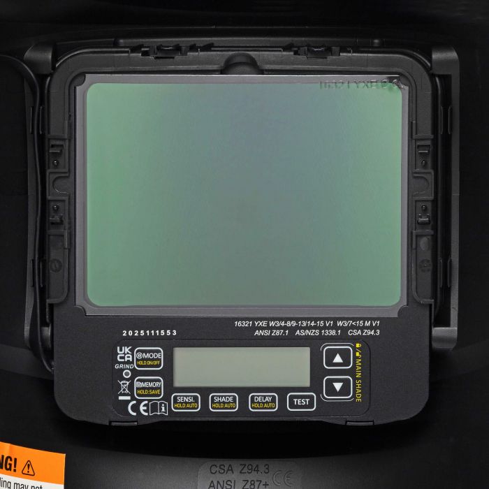 Close-up of the True Color auto-darkening lens and digital controls on the Eastwood W9400 welding helmet.