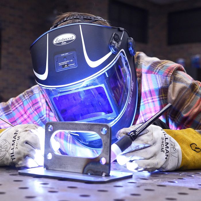 Welder using the Eastwood Elite Vista-Arc panoramic welding helmet during TIG welding.