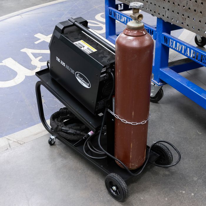 Eastwood low profile welding cart holding a shielding gas cylinder with integrated safety chain.