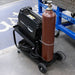 Eastwood low profile welding cart holding a shielding gas cylinder with integrated safety chain.